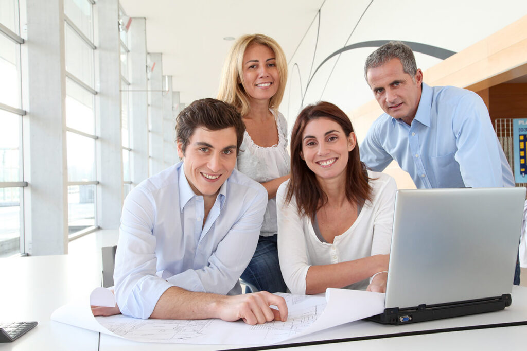 Spry Wireless: Office staff using the computer for work.